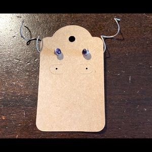 Sterling silver twirl on earrings with amethyst stone.